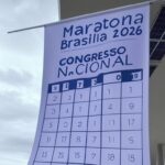 Banner de inscrições para Maratona Brasília 2026 no Eixo Monumental, com promessas de inovação mas sem data definida.