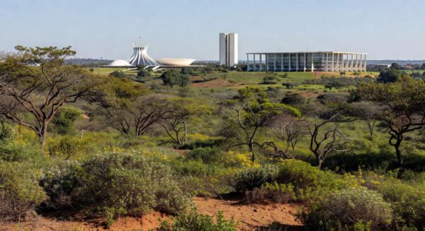 Área ambiental em Brasília com vegetação do Cerrado e edifícios ao fundo, representando ação contra uso na capitalização do BRB.